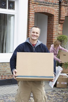 Moving van in Richmond with boxes prepared for recycling and reuse