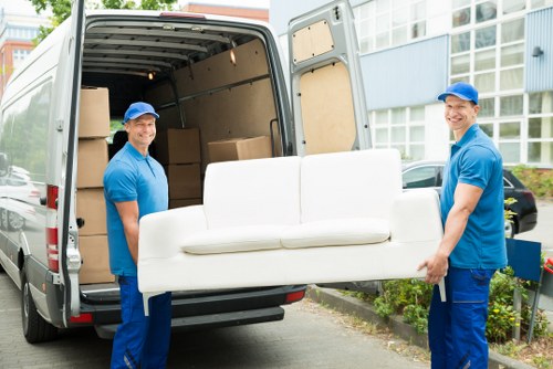 Removal team handling furniture access in Richmond